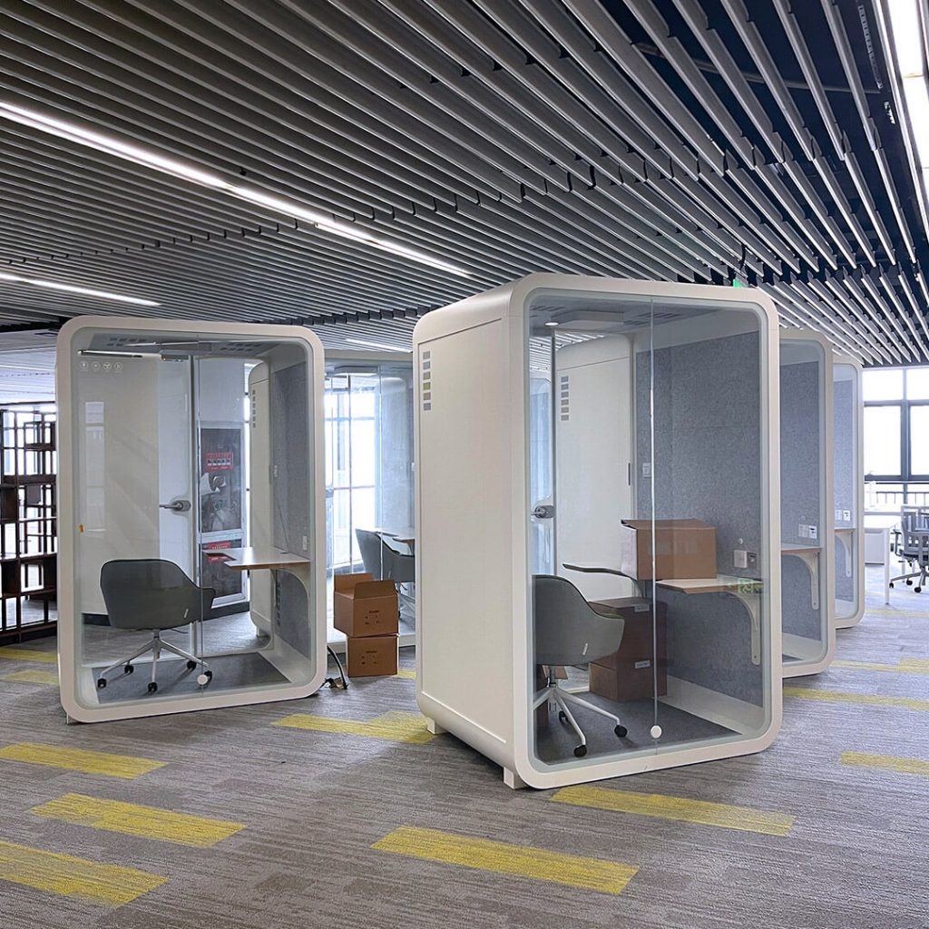 Five Soundbox's office privacy pods are placed in open office